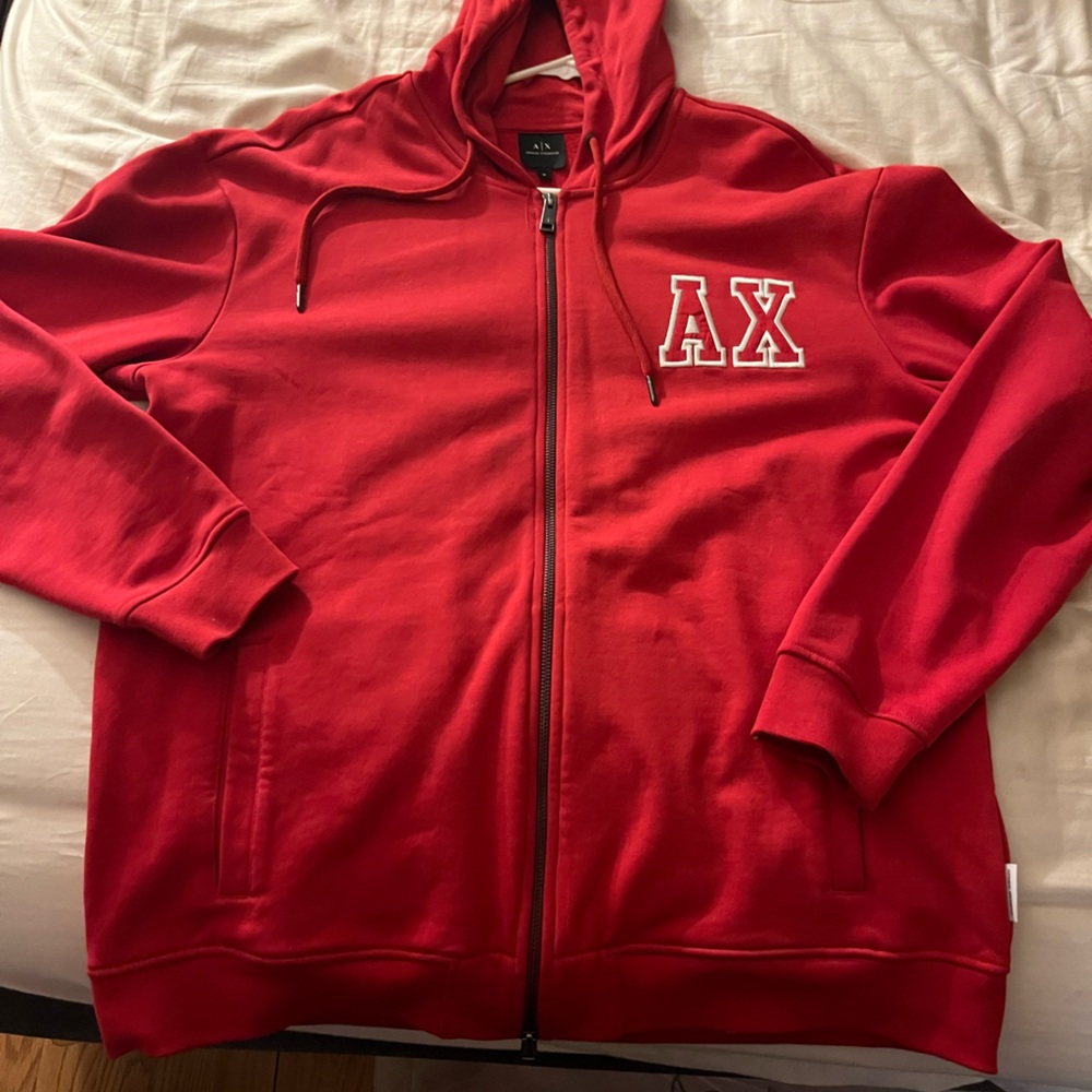 Listed as M but fits like a Large Armani Exchange zip up hoodie red